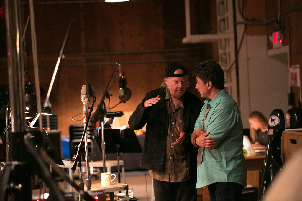 Neil Young and producer Niko Bolas, in the studio recording Young’s vocals for the new LP Storytone. 
